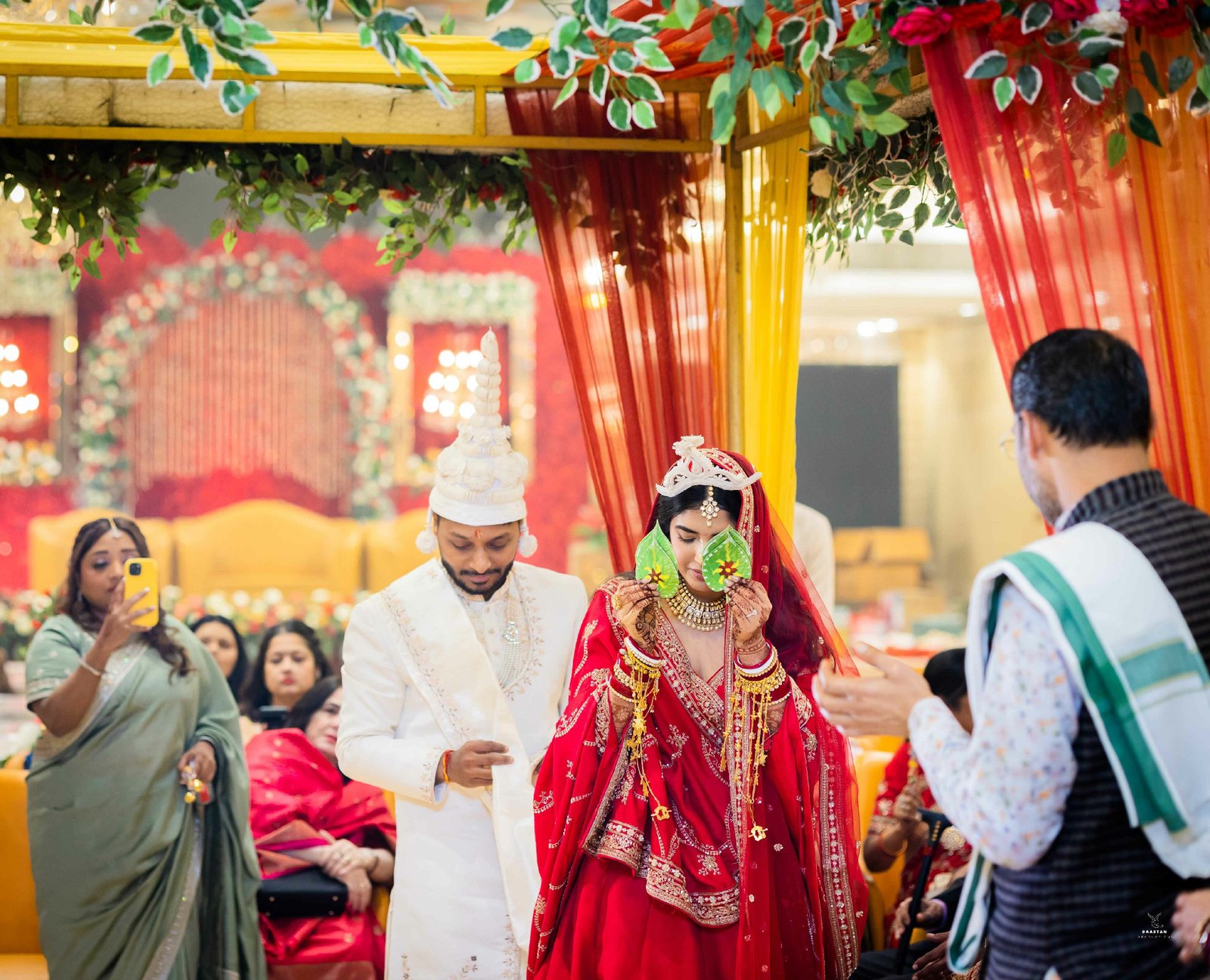 Bride's ceremonial entry during baraat procession at Indian wedding, professional coverage