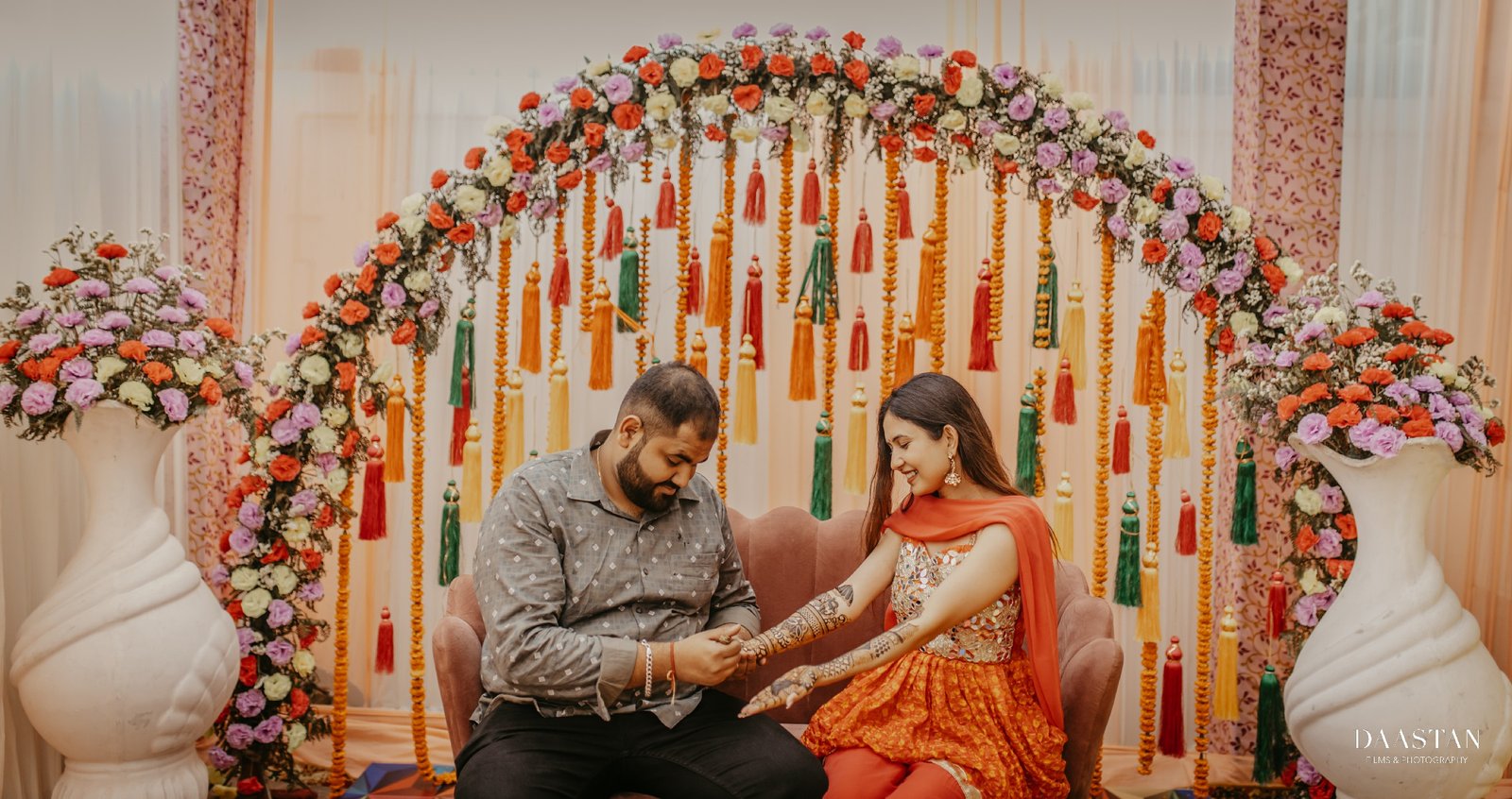Couple photographed together during mehendi ceremony, pre-wedding candid photography India