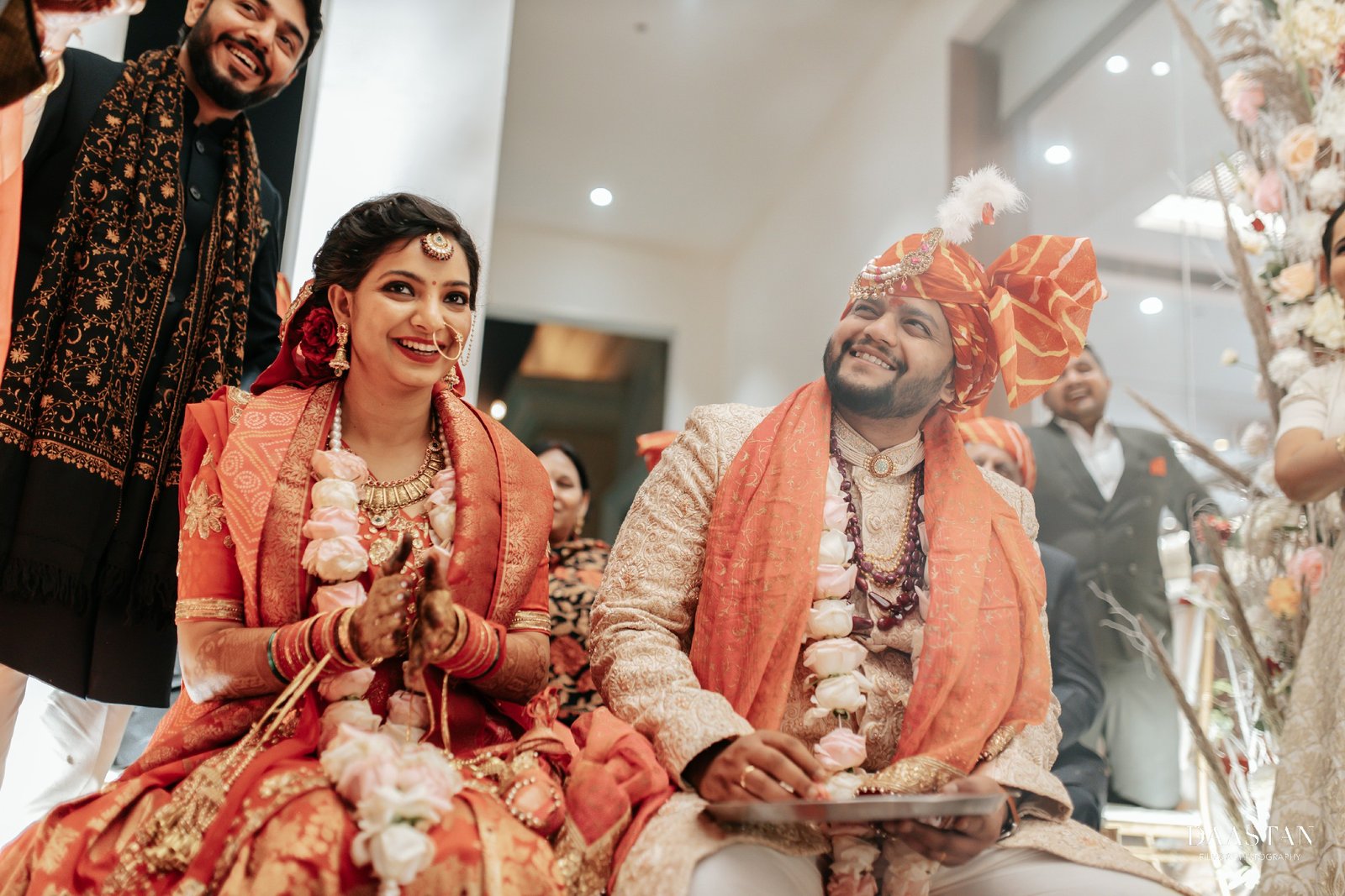 Couple at wedding mandap during pheras ritual, professional Indian wedding production photography