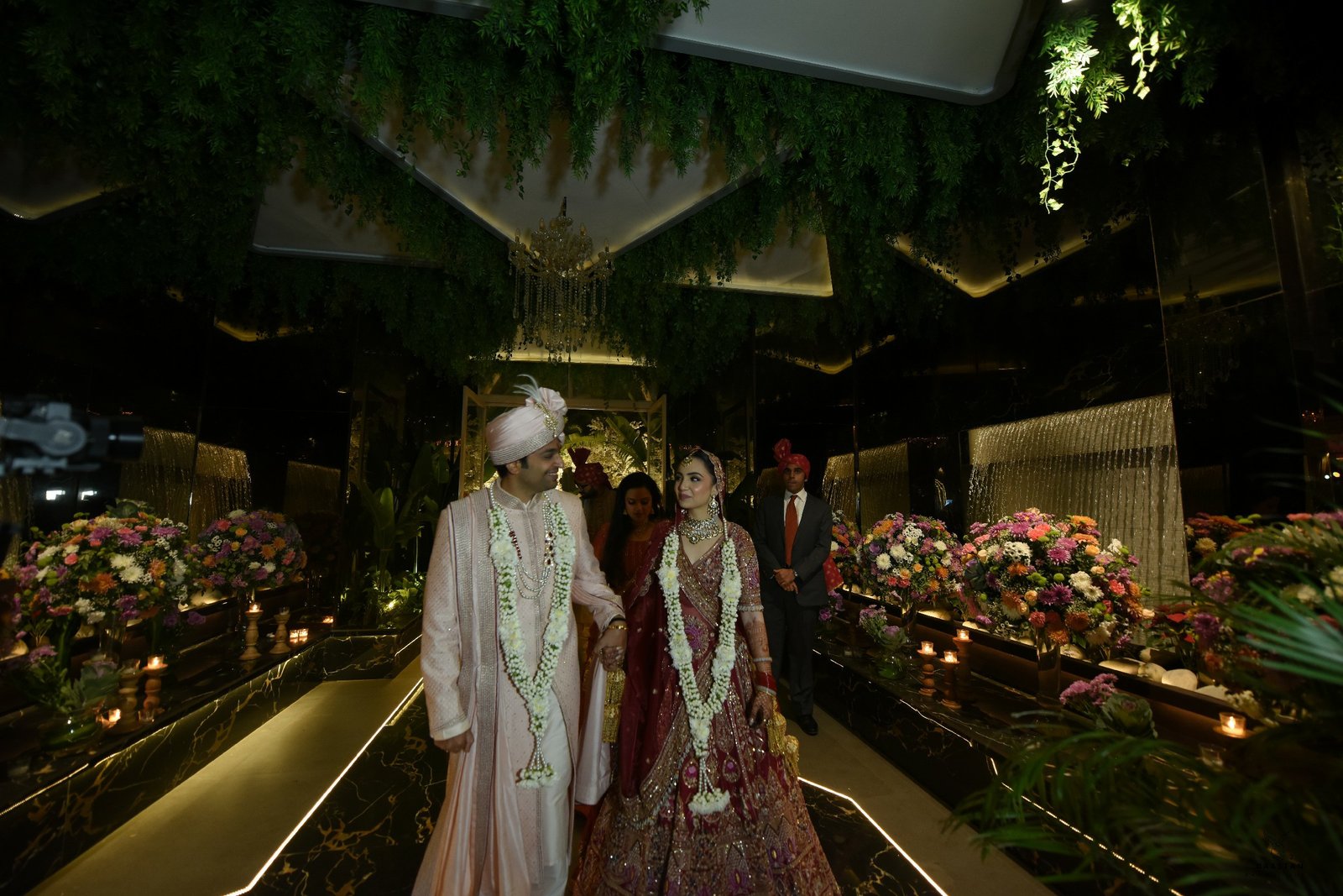 Bride and groom during sacred pheras with holy fire, professional Indian wedding production house coverage