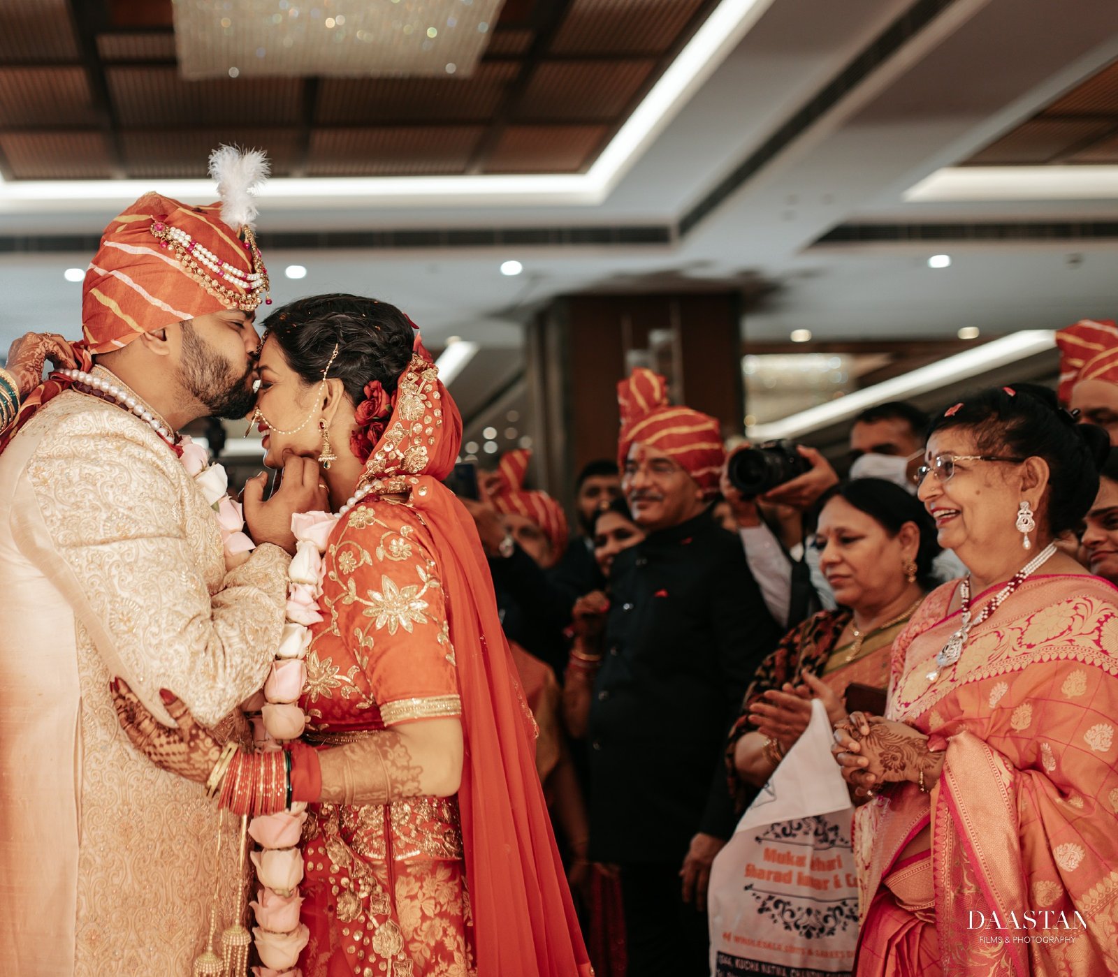 Hindu wedding pheras ceremony with couple taking sacred vows, professional wedding photography India