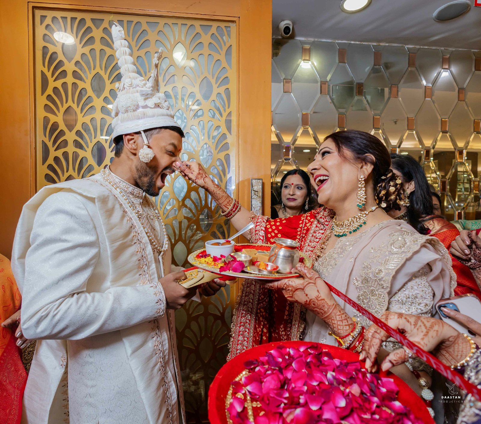 Candid pre-wedding shoot of bride and groom, professional Indian wedding production house