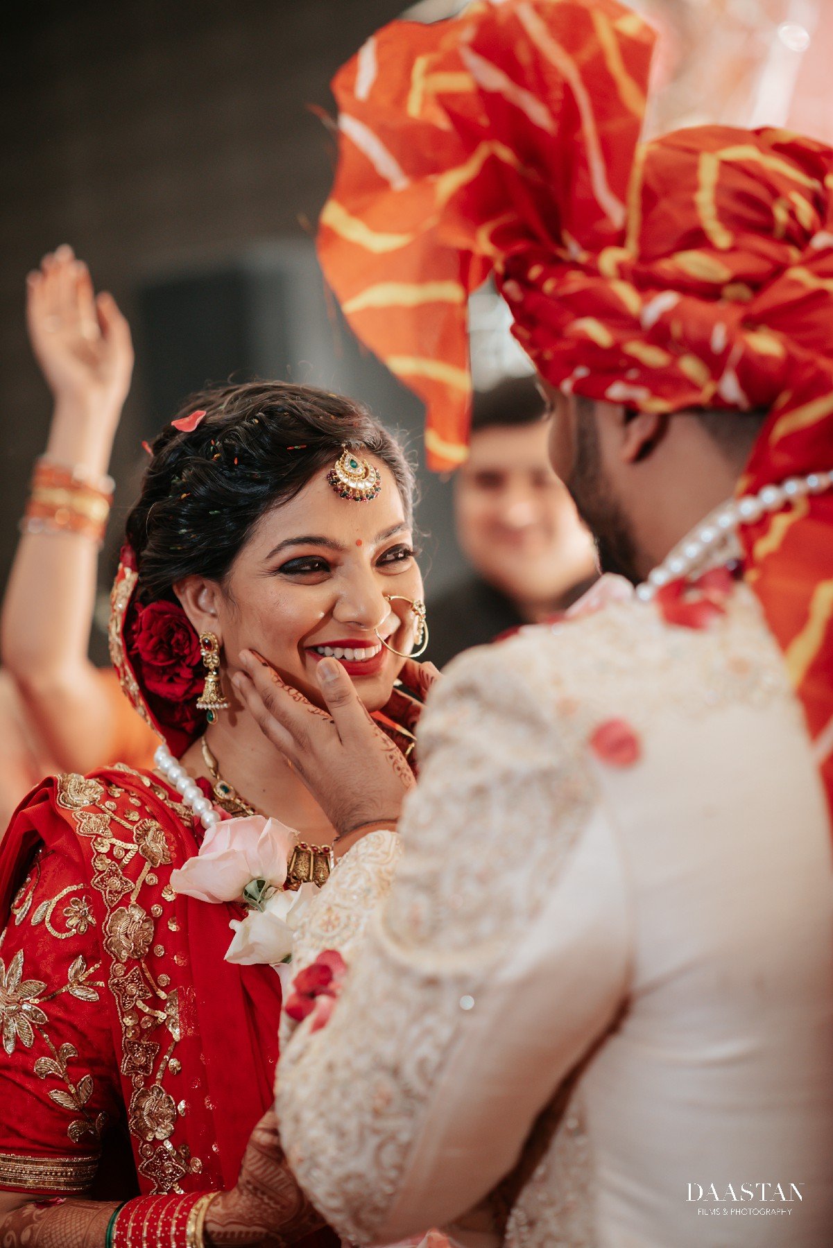 Tender forehead touch moment between groom and bride, intimate Indian wedding photography