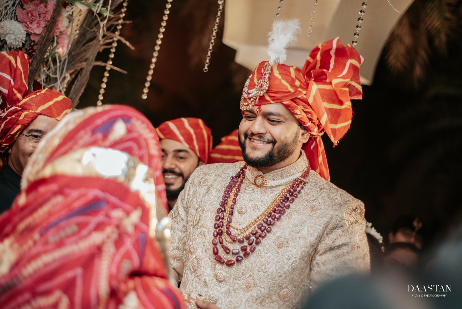 Groom holding bride's hands during pheras ceremony, intimate Indian wedding photography