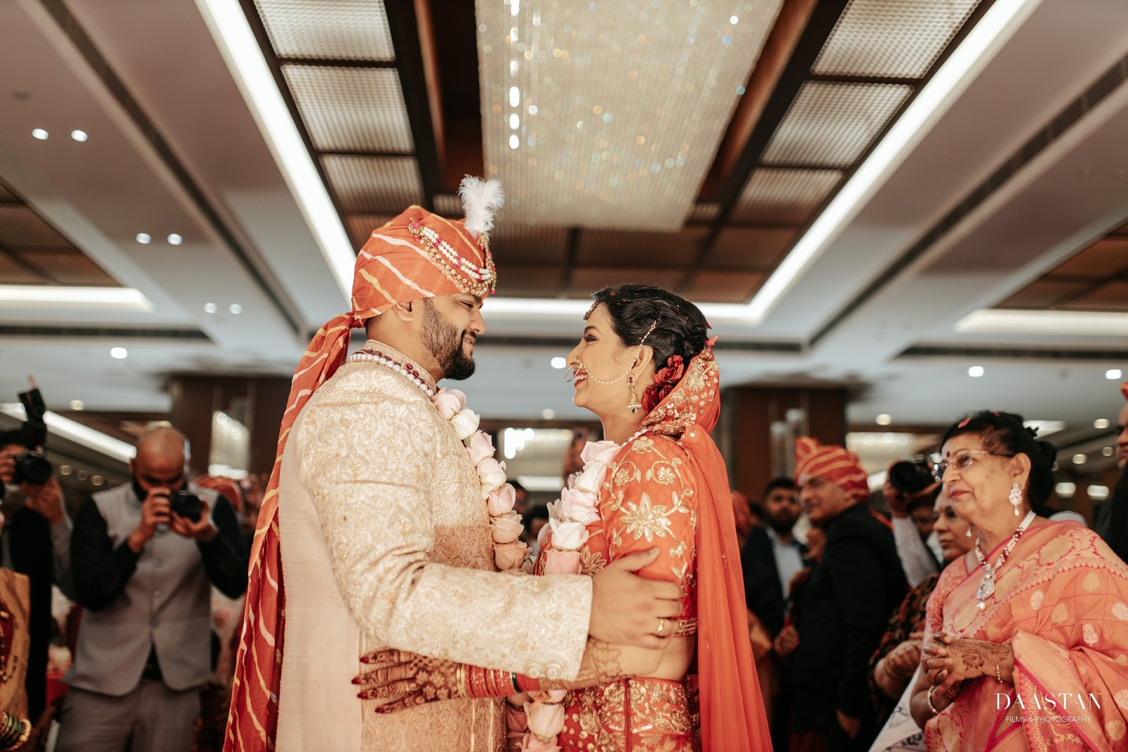 Groom in decorative sehra during baarat procession, cinematic Indian wedding photography