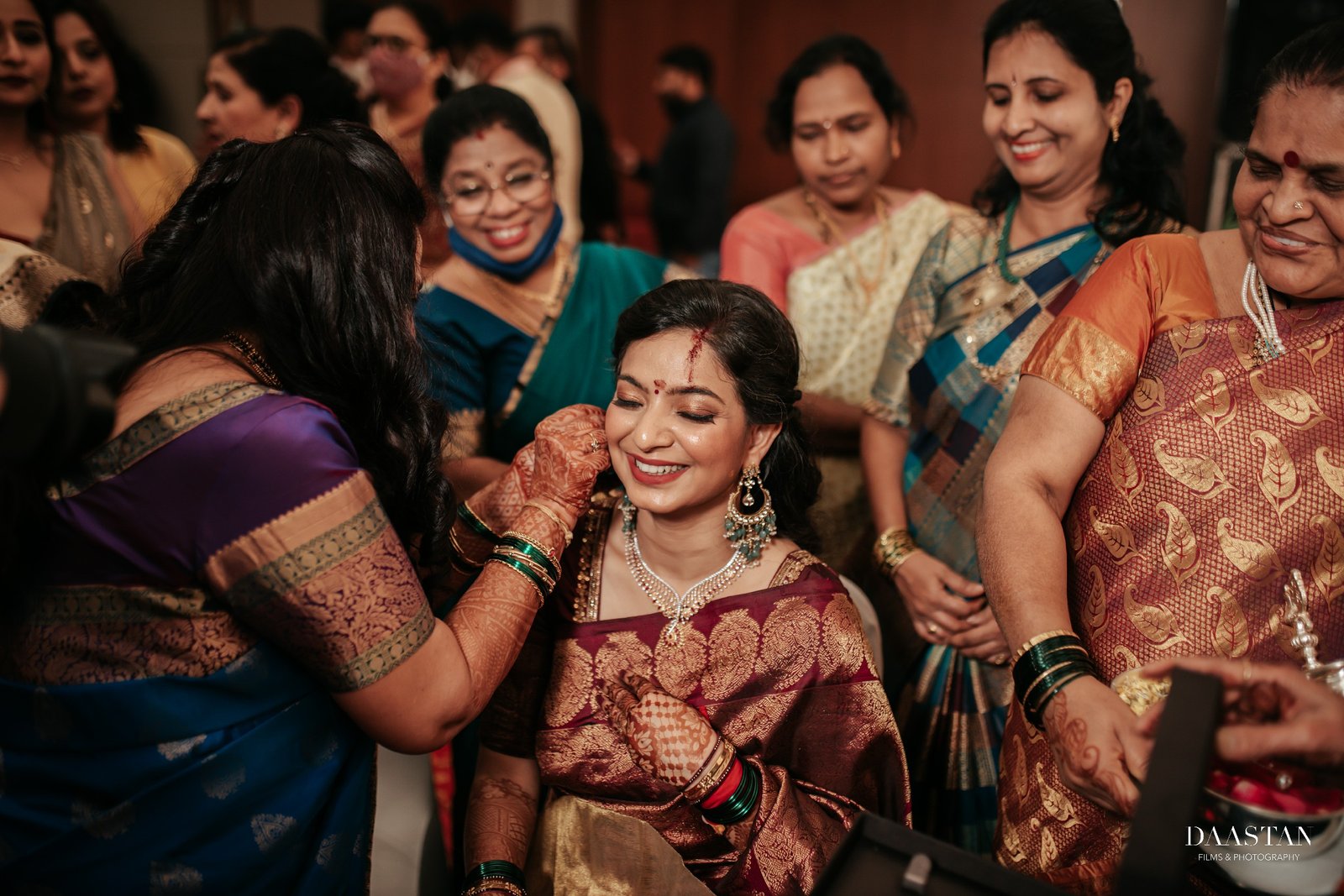 Joyful wedding guests celebrating in traditional Indian attire at a luxury wedding event in India
