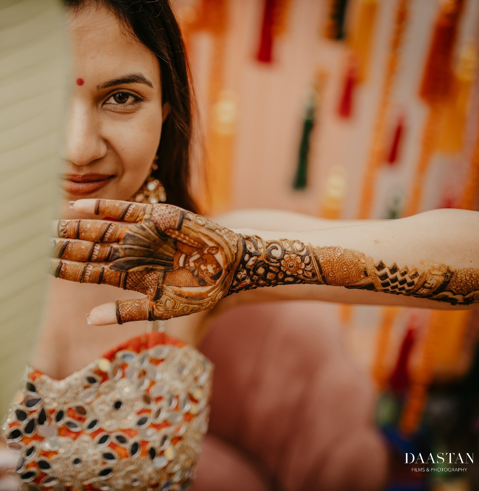 Close-up of intricate bridal mehendi henna on bride's hands, detail shot Indian wedding photography