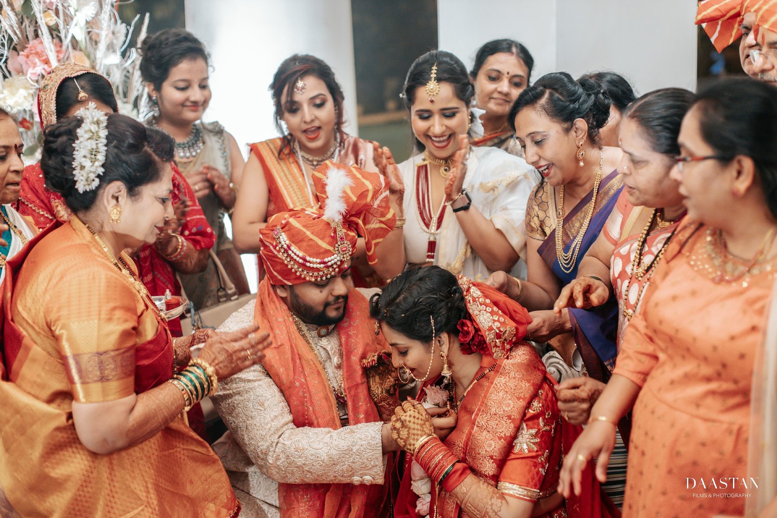 Family witnessing pheras ceremony at Indian wedding mandap, professional wedding production house
