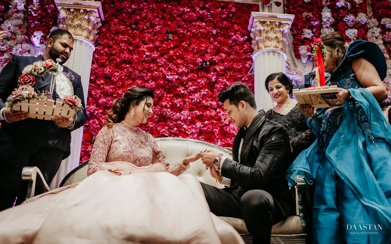 Couple at wedding reception with guests, professional Indian wedding event photography