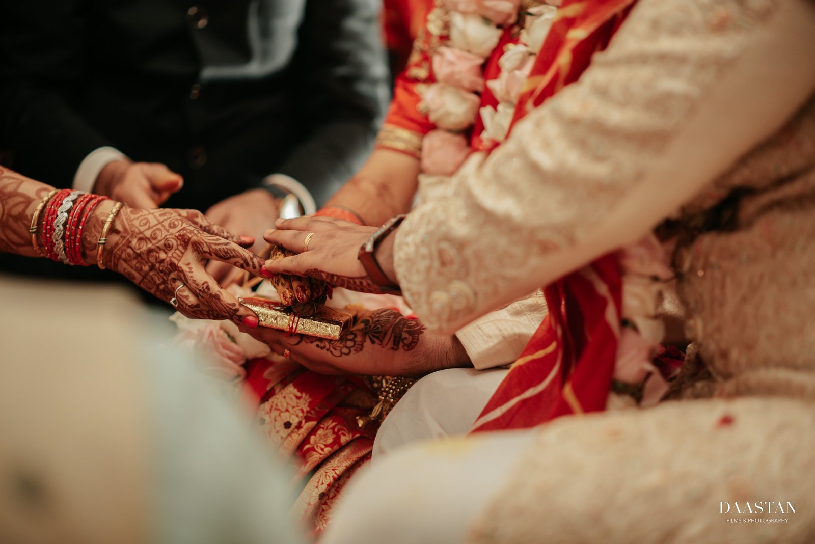 Close-up of sindoor ritual during Indian wedding ceremony, traditional wedding photography