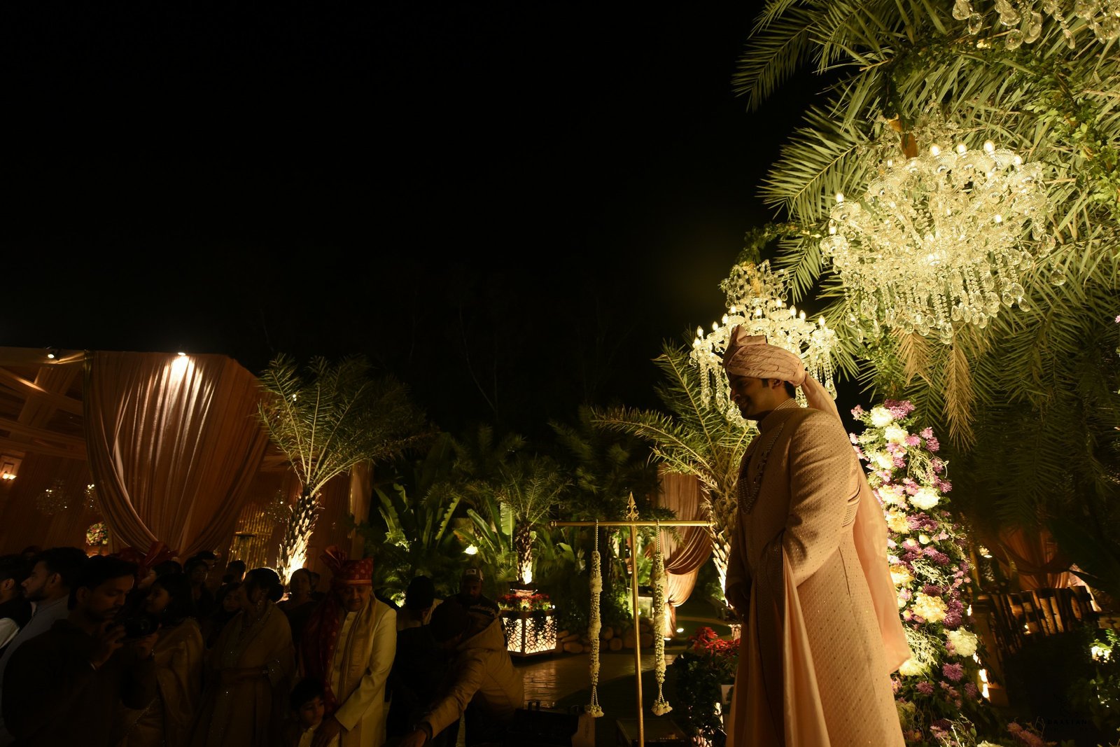 Grand Indian wedding reception hall with guests, professional event coverage by wedding production house